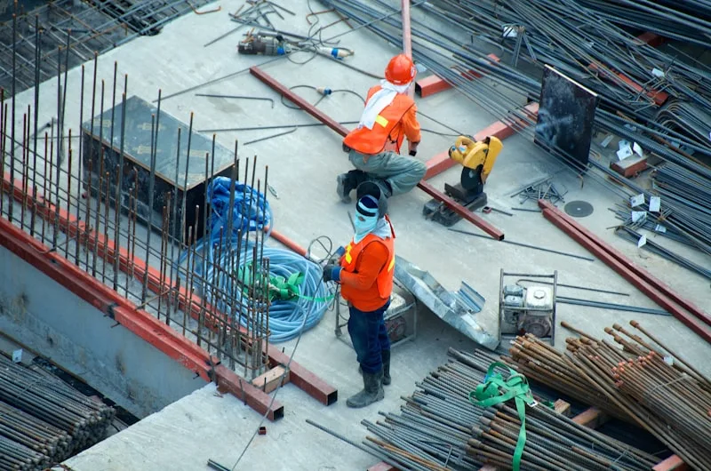 CCD21 project manager surveying luxury construction site at sunset